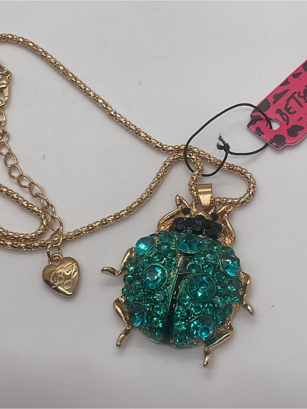 Betsey Johnson Gold-Tone Beetle Pendant Necklace with Teal-Green Crystals - Picture 4 of 6
